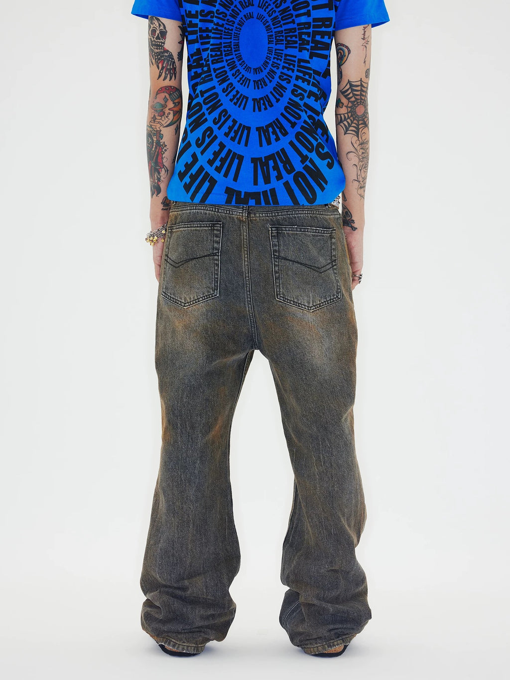 CHAI rust effect distressed jeans model back view