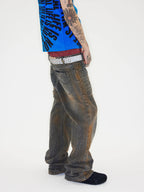CHAI rust effect distressed jeans model side view