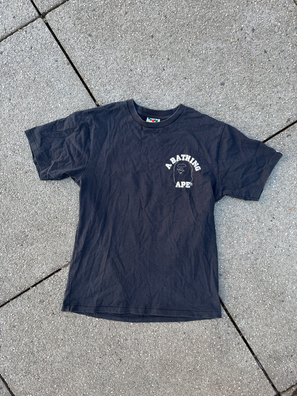 A BATHING APE – 1st Camo Face Over College Tee (Black)