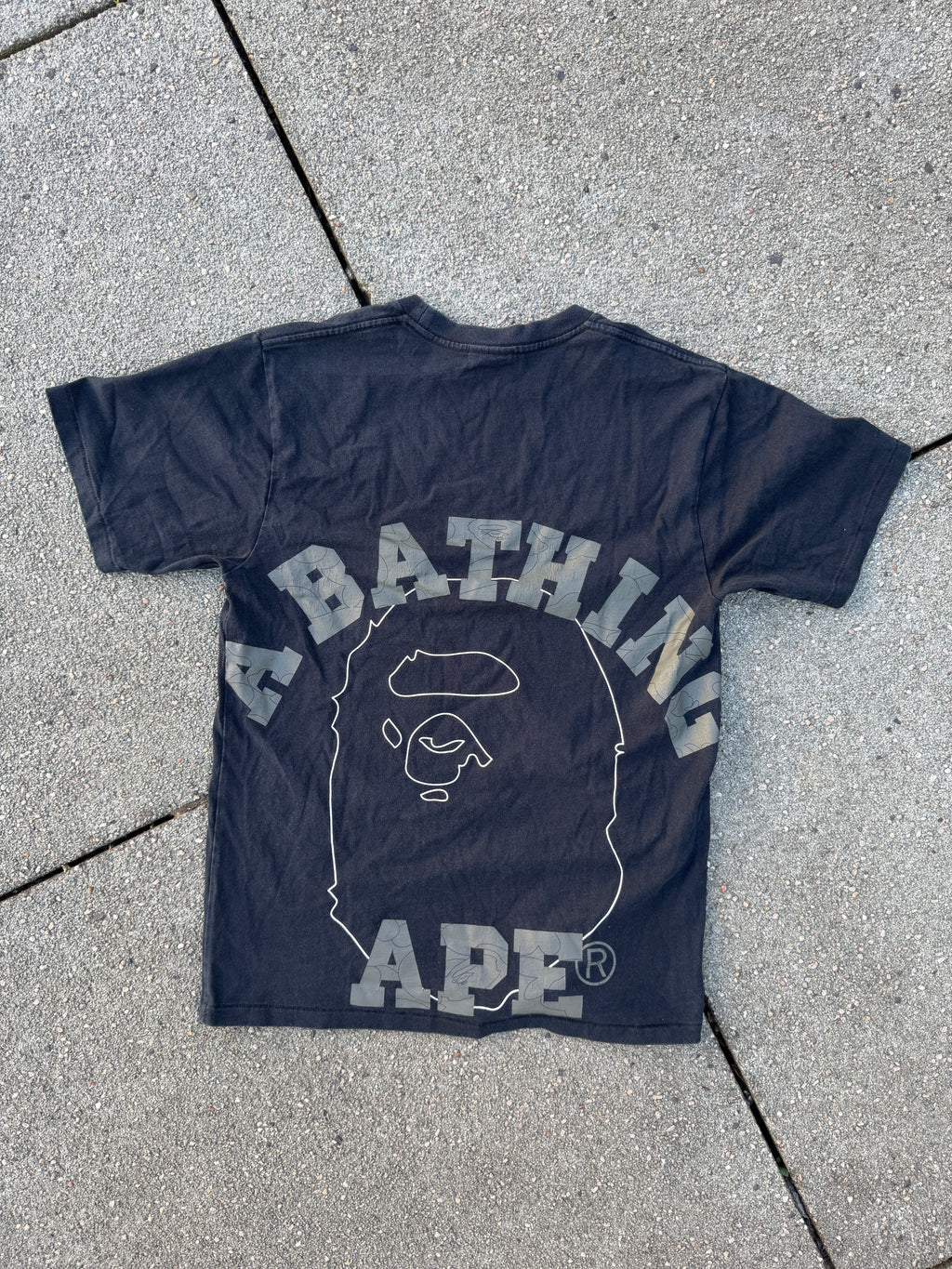 A BATHING APE – 1st Camo Face Over College Tee (Black)