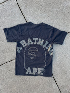 A BATHING APE – 1st Camo Face Over College Tee (Black)