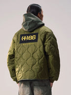 REMEDY patchwork padded jacket model back view
