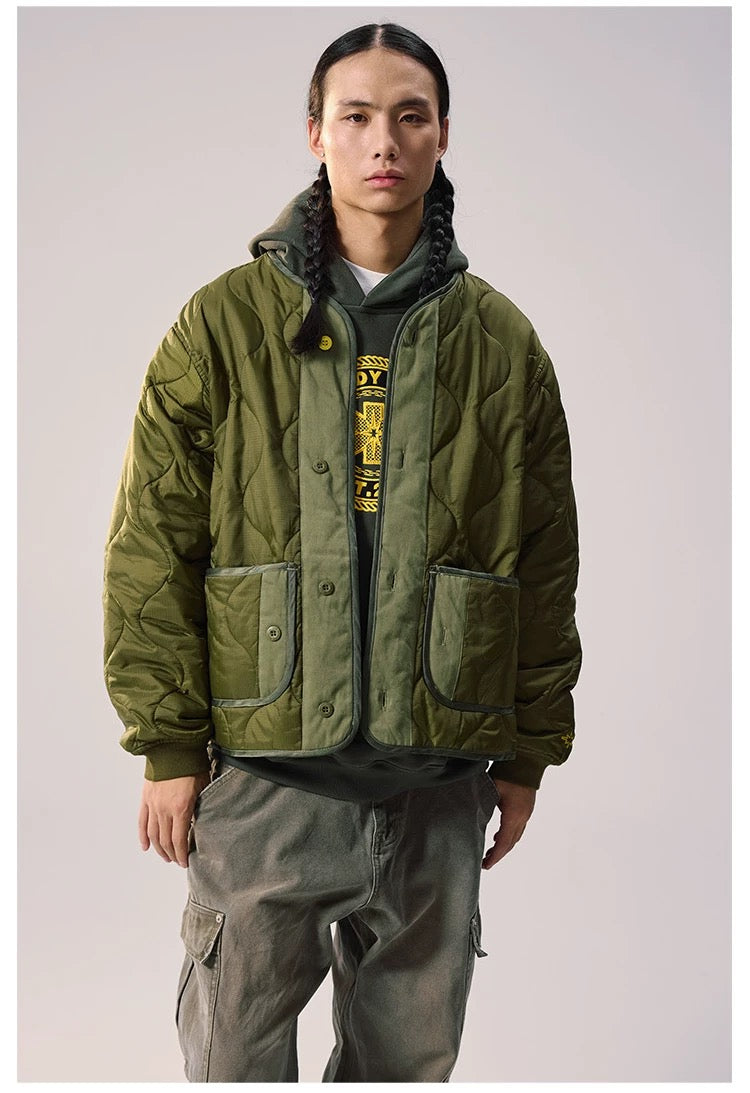 REMEDY patchwork padded jacket model front view