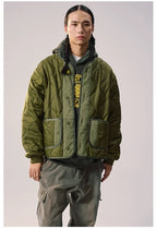 REMEDY patchwork padded jacket model front view